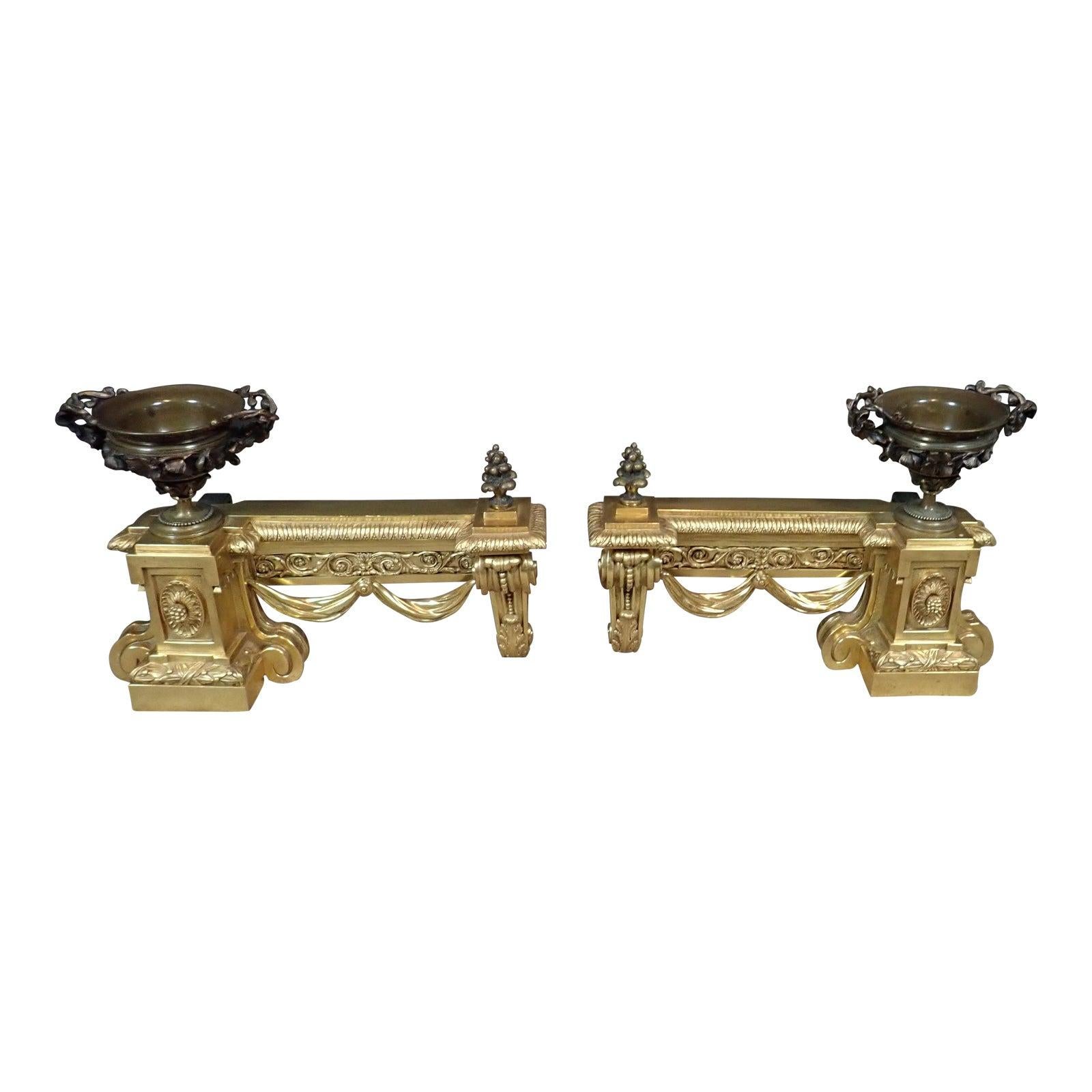 A Pair of Louis XVI Gilt and Patinated Bronze Chenets 