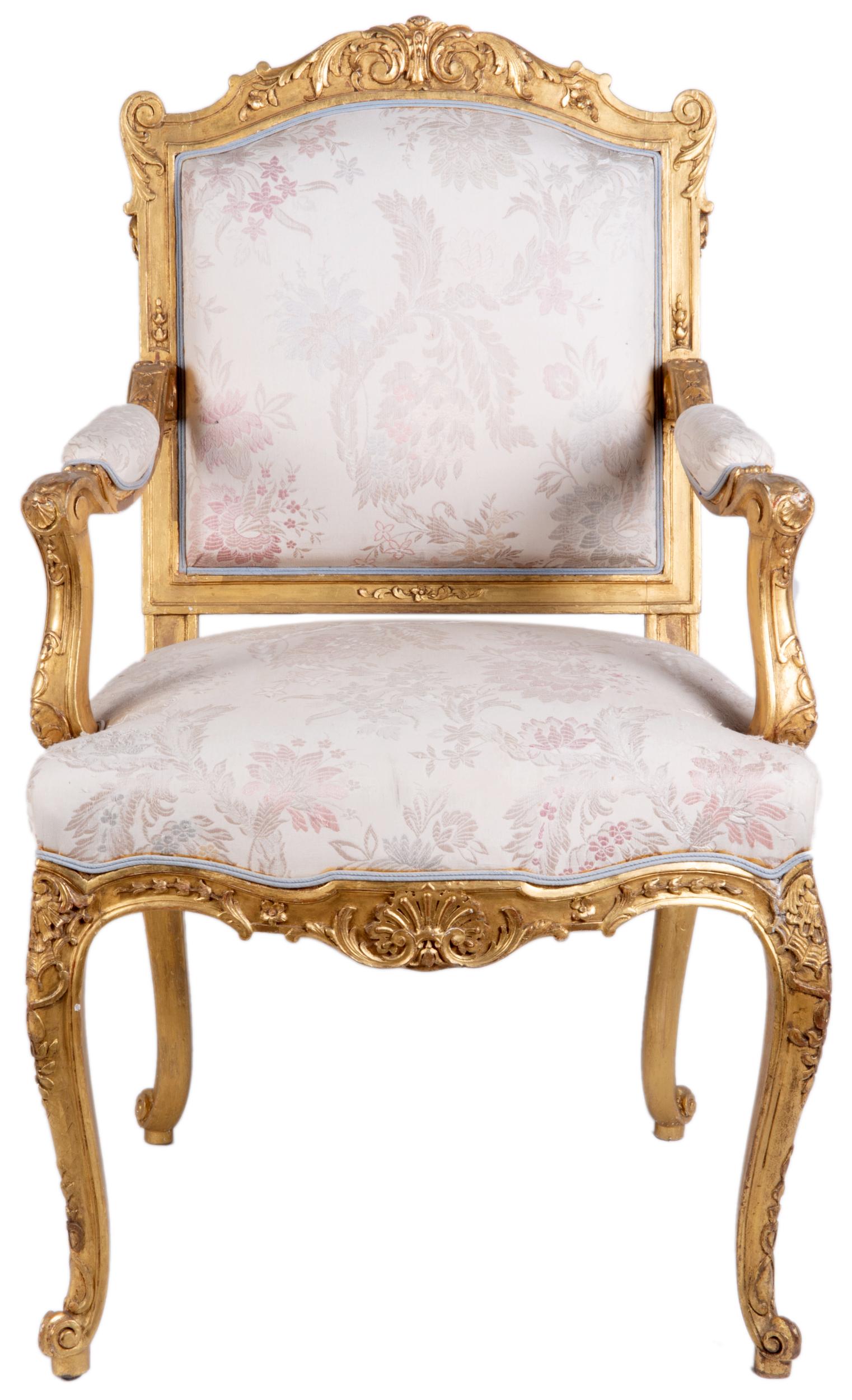 A very good quality pair of late 19th century French gilt fauteuil, each with carved 'C' scroll and foliate decoration to the show-wood, upholstered backs, arm rests and seats. Raised on elegant carved cabriole legs.
Stamped ' Mellier &