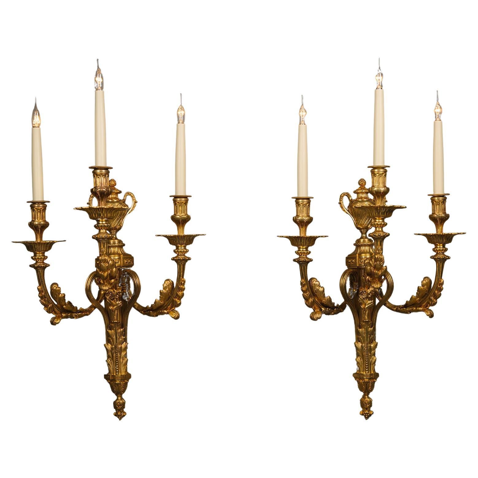 A Pair of Louis XVI Style Gilt-Bronze Three-Light Wall-Appliques For Sale