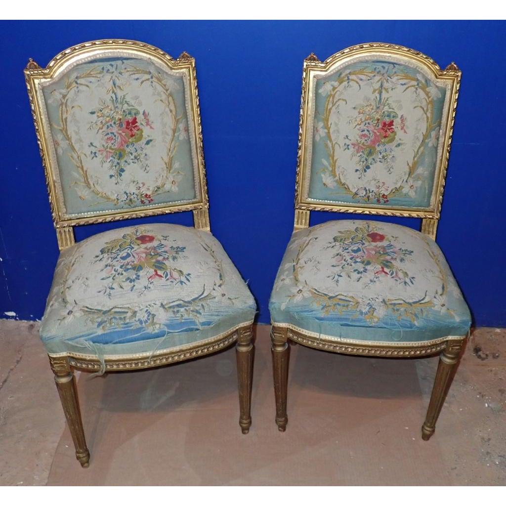 A Pair of Louis XVI Style Gilt Petit Point Embroidered Chairs. Pair of floral Petit Point Embroidered Chairs, Louis XVI Style.
Gilt wood frames.