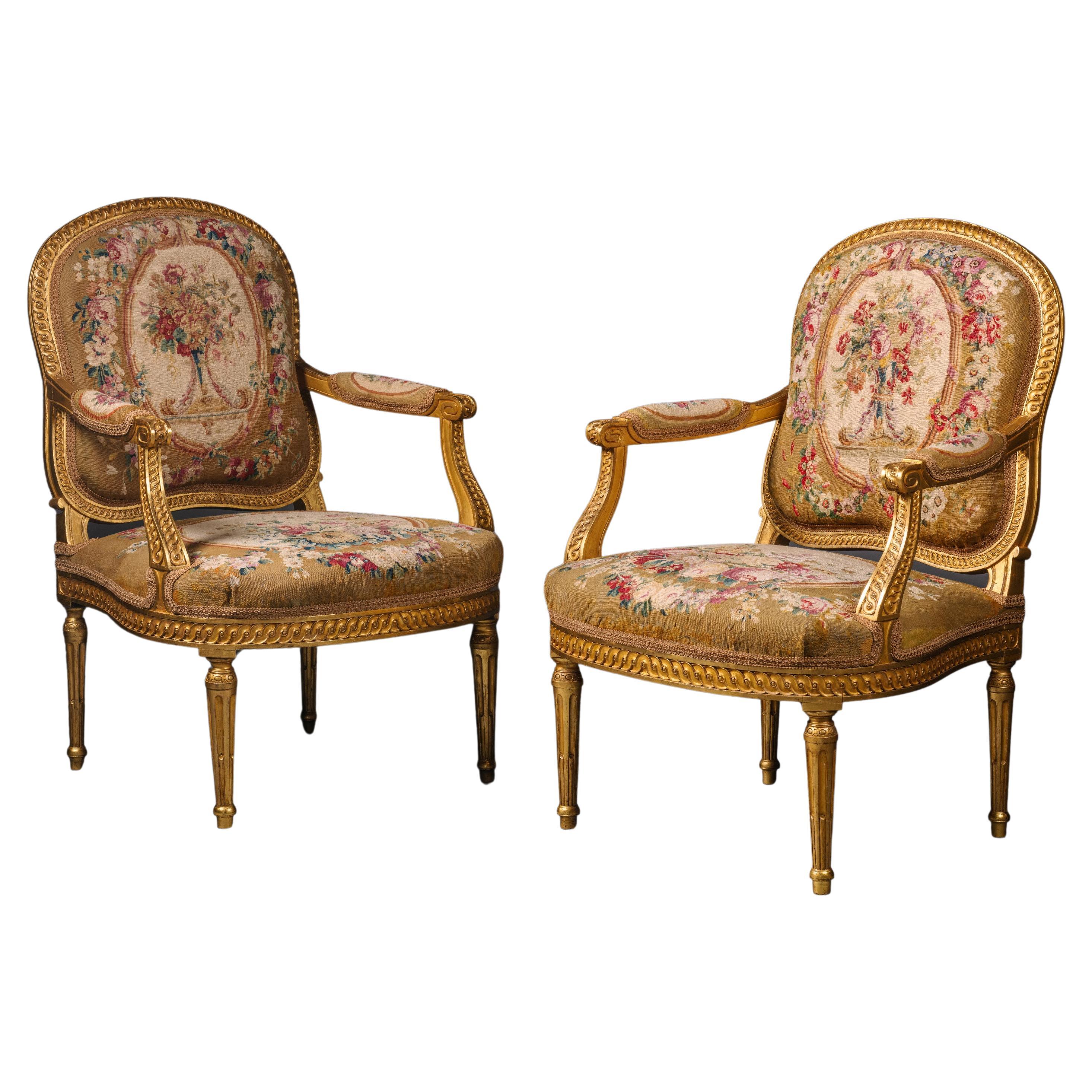 Paar Fauteuils im Stil Louis XVI aus Giltholz und Tapisserie im Angebot