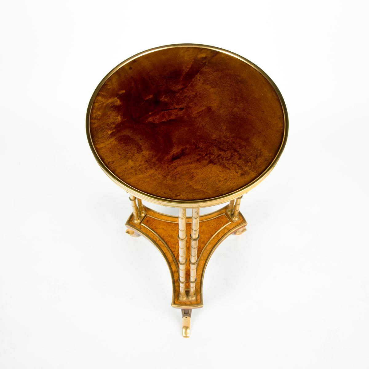 Mahogany A pair of Louis XVI style mahogany and ormolu gueridons, after Adam Weisweiler For Sale