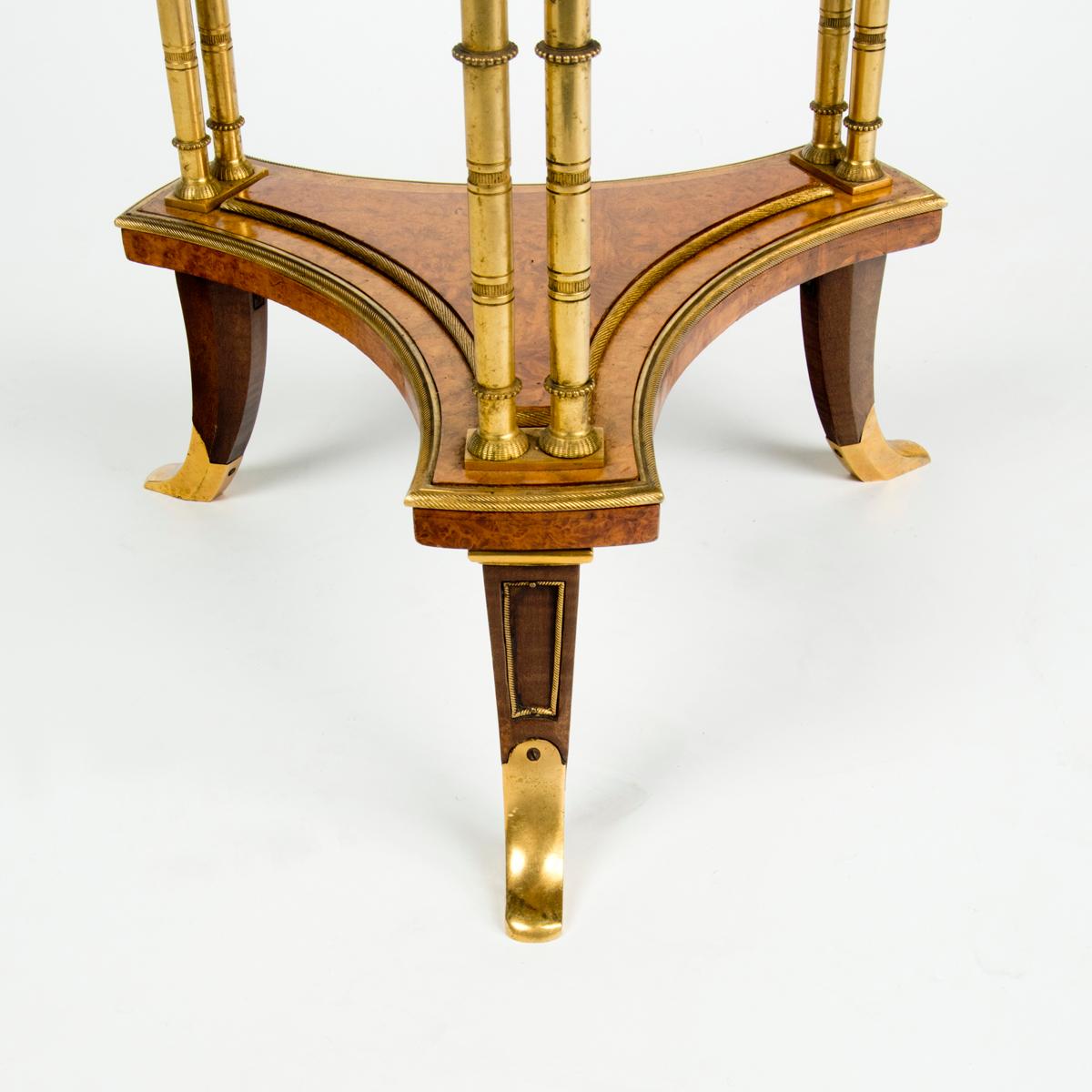 A pair of Louis XVI style mahogany and ormolu gueridons, after Adam Weisweiler For Sale 1