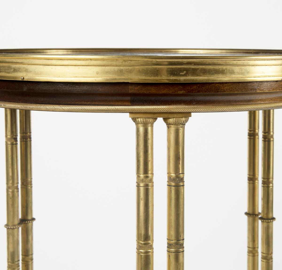 A pair of Louis XVI style mahogany and ormolu gueridons, after Adam Weisweiler For Sale 2
