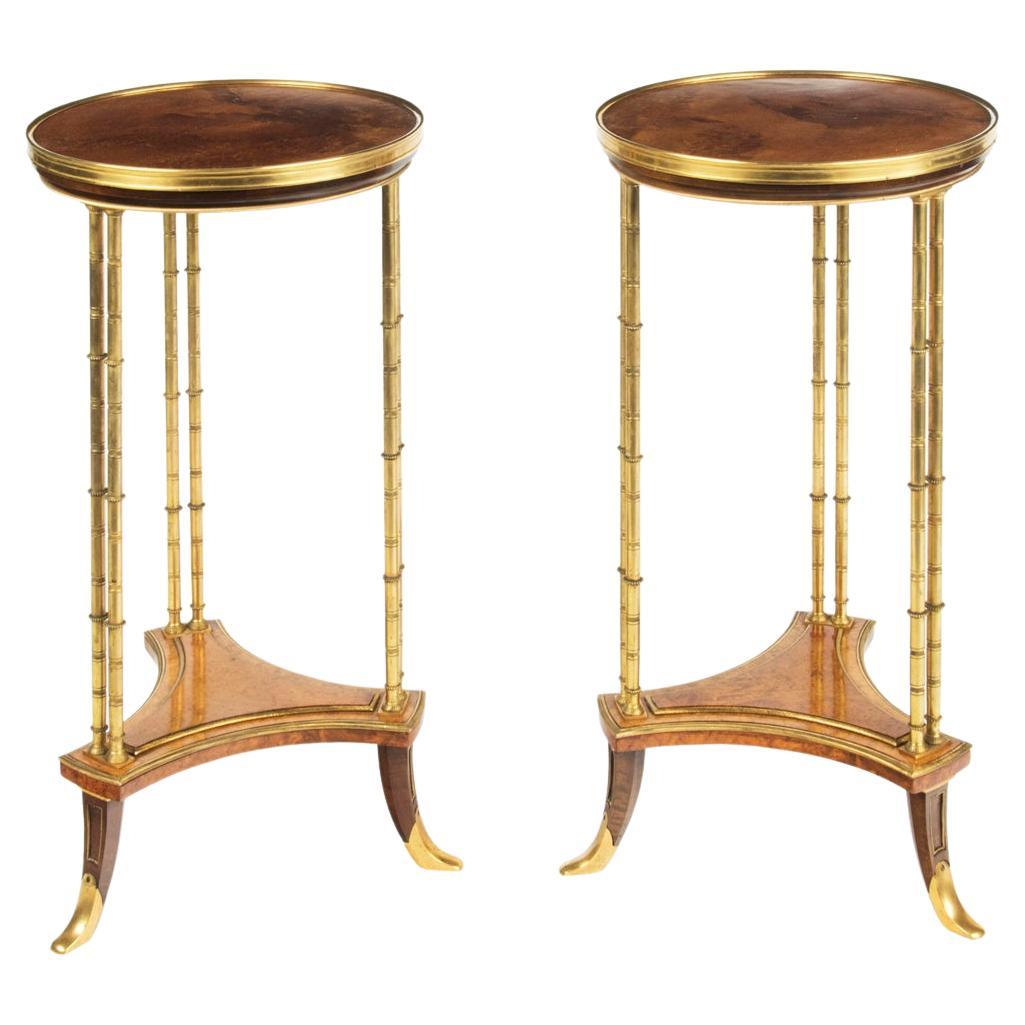 A pair of Louis XVI style mahogany and ormolu gueridons, after Adam Weisweiler For Sale