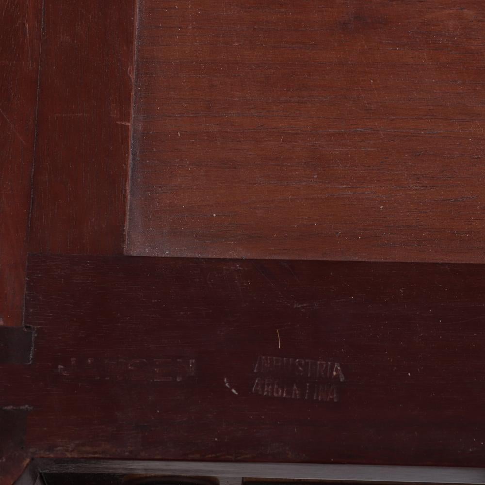 A Pair of Louis XVI style marble top mahogany commodes, signed Jansen, C 1940. For Sale 1