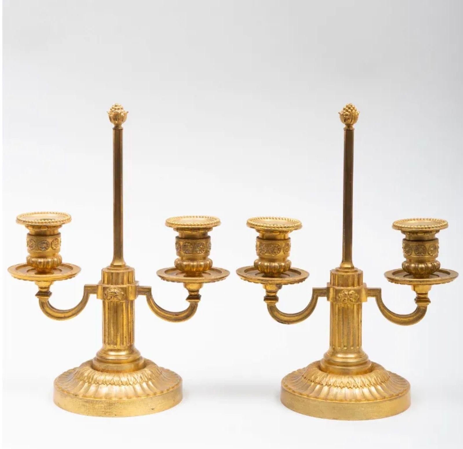 A Pair of Louis XVI Style Two-Light Ormolu Candlesticks In Good Condition For Sale In Spencertown, NY