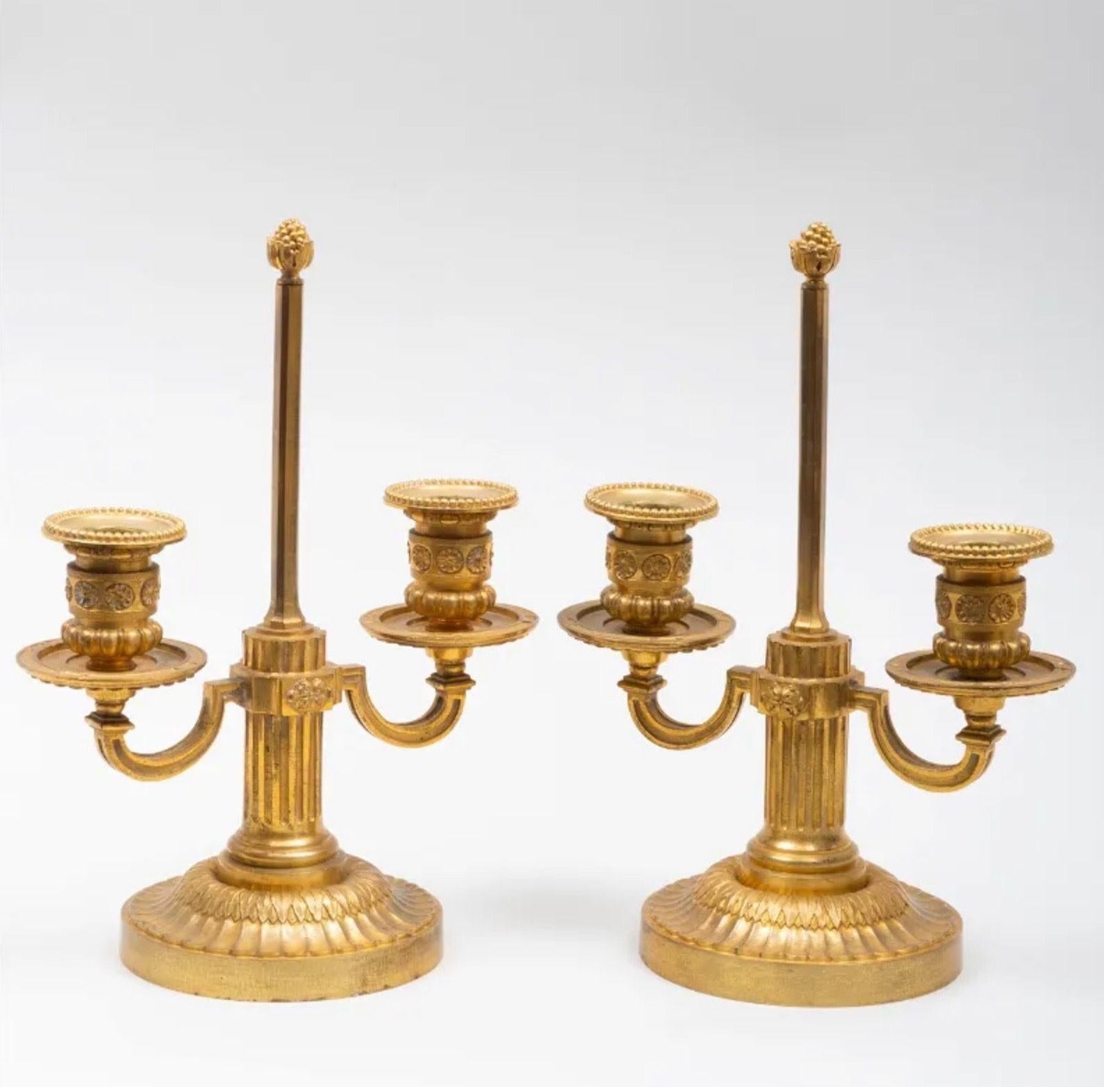 A Pair of Louis XVI Style Two-Light Ormolu Candlesticks For Sale 2