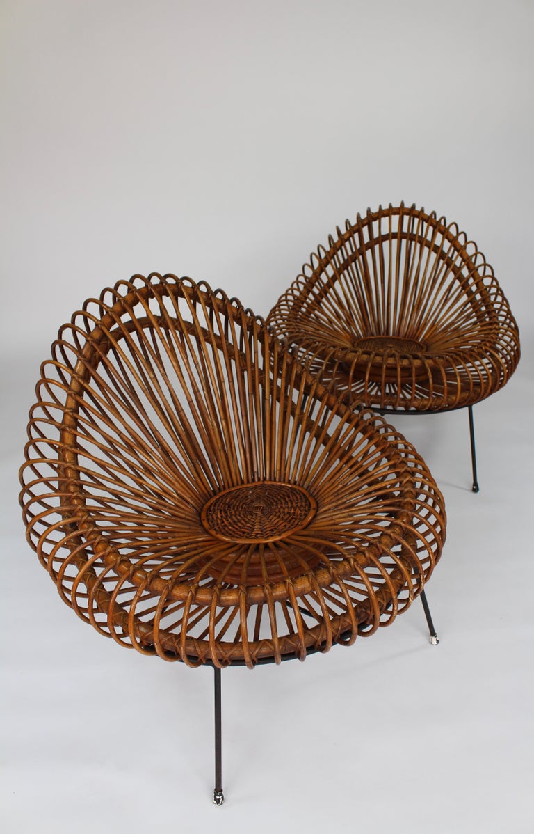 A elegant and timeless pair of basketware lounge chairs by Janine Abraham & Dirk Jan Rol for Rougier.

The rattan basket schell is supported by black lacquered steel frame.
 