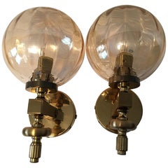 A pair of lovely Brass Structure Glass Wall Lamp Sconces from Germany