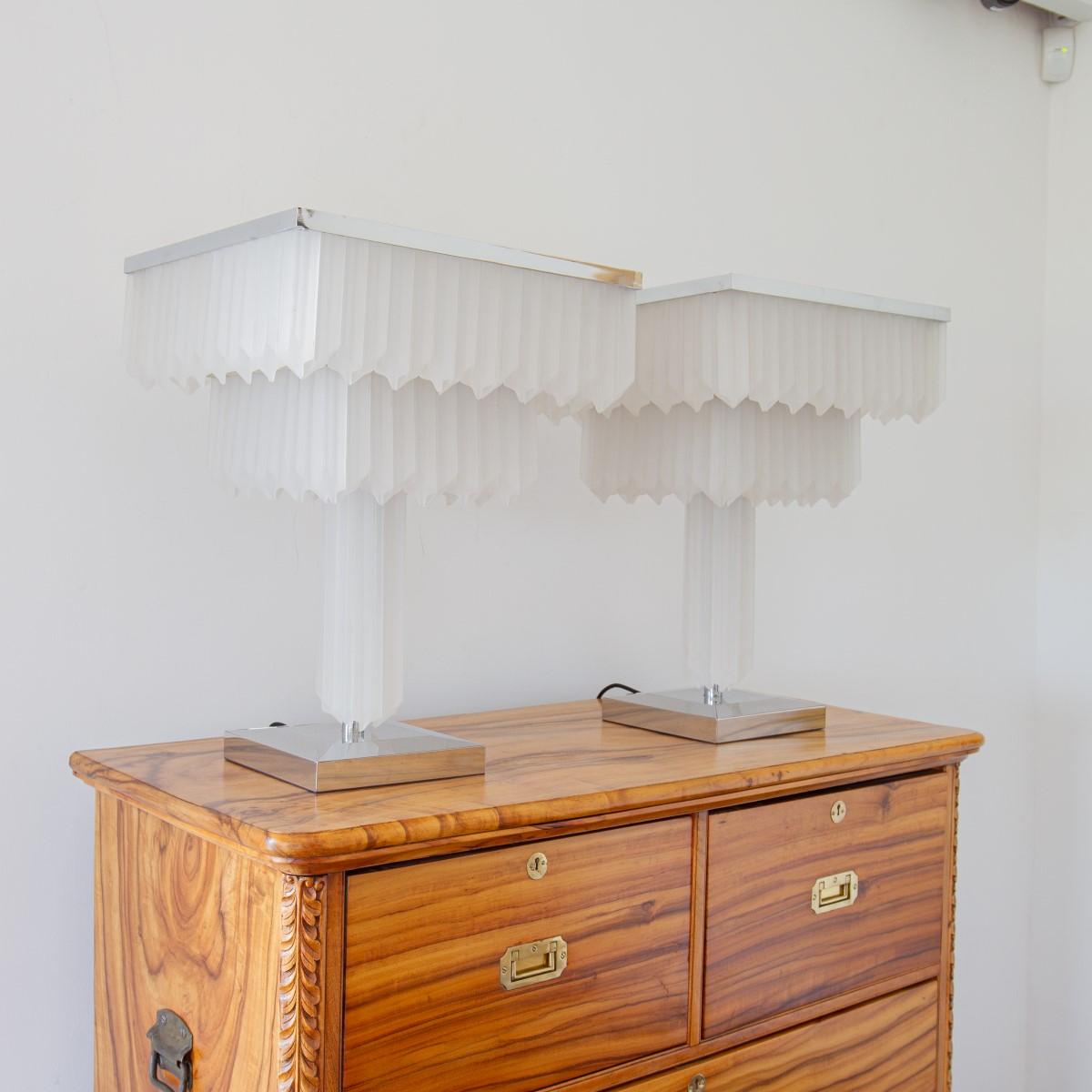 A pair of square nickel based chandelier table lamps with 1970s lucite drops, created by Ken Bolan.