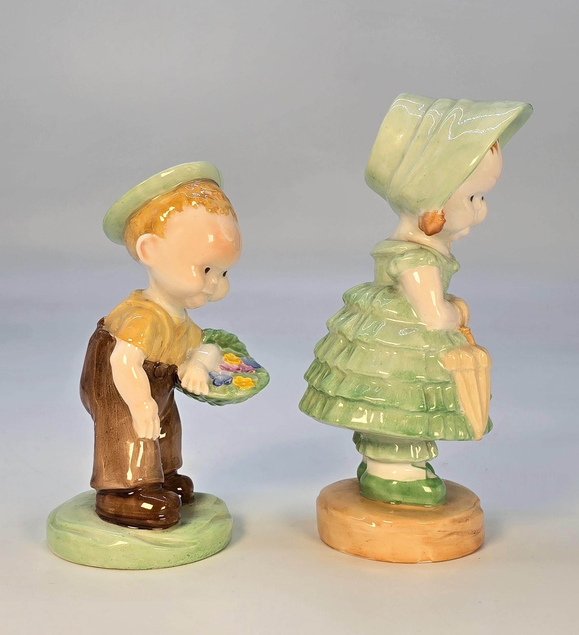 A pair of Mabel Lucie Attwell  porcelain figures made by Shelley, English C1930 (Art déco) im Angebot
