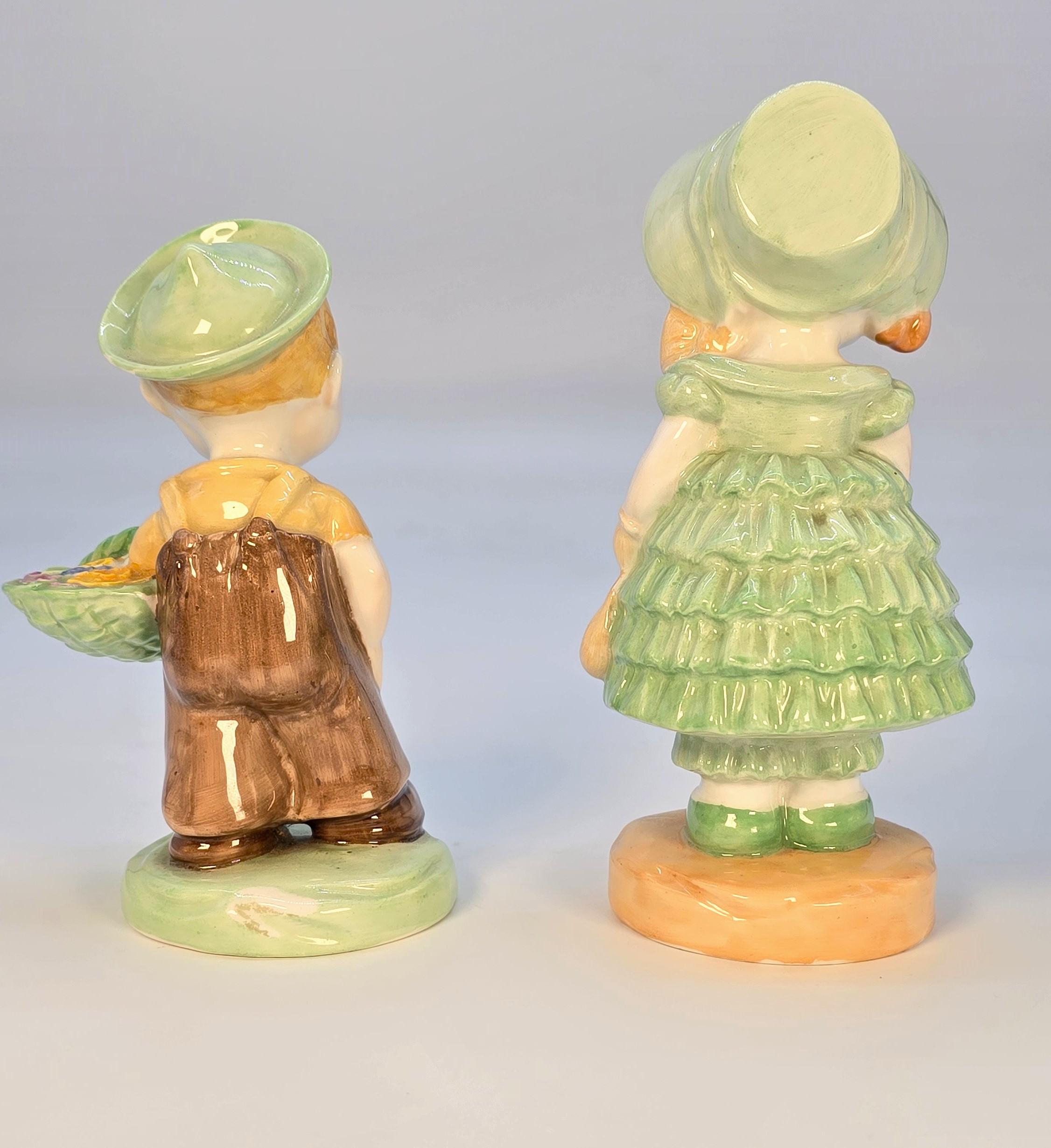 A pair of Mabel Lucie Attwell  porcelain figures made by Shelley, English C1930 (Britisch) im Angebot