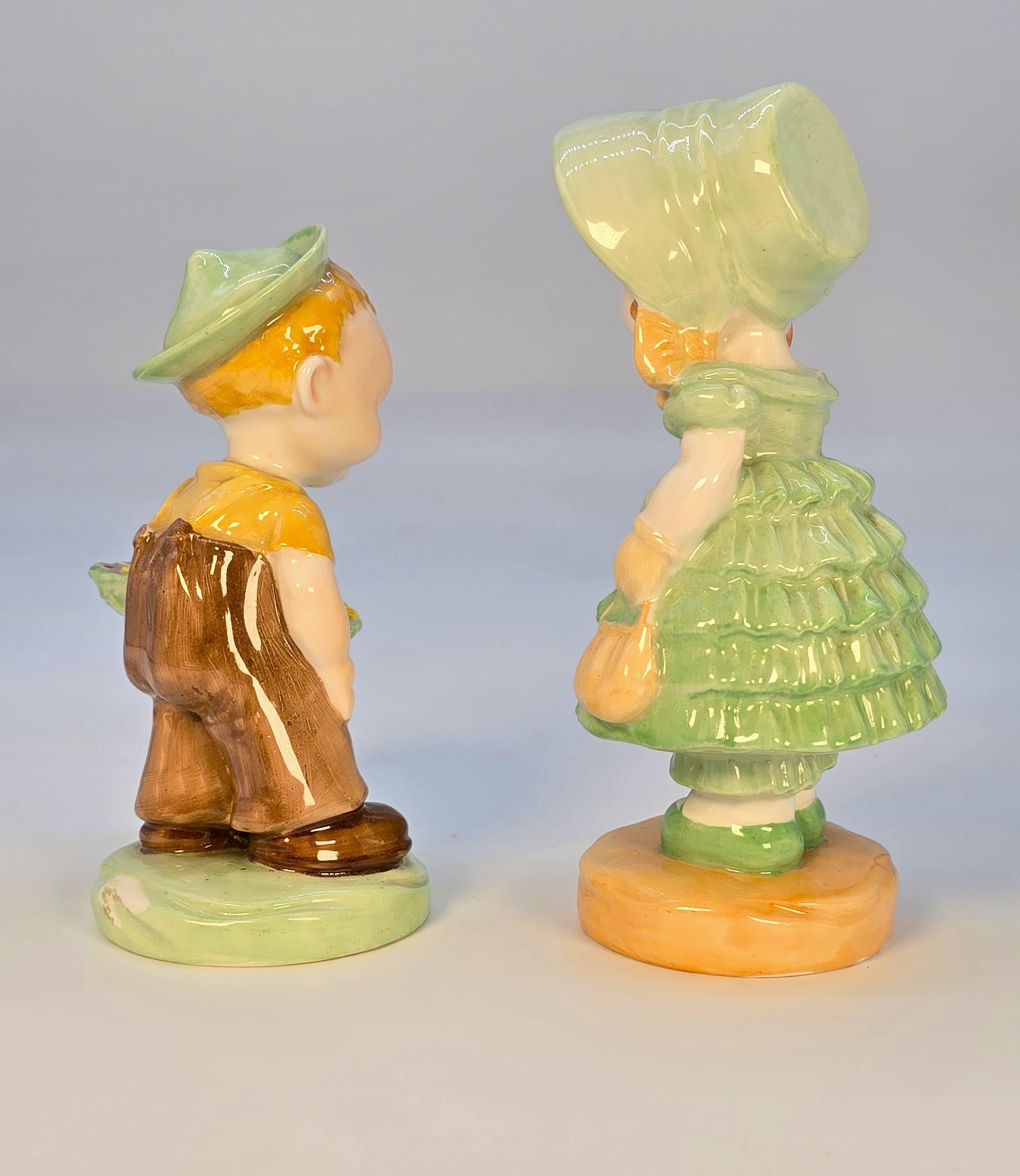 A pair of Mabel Lucie Attwell  porcelain figures made by Shelley, English C1930 (Handbemalt) im Angebot