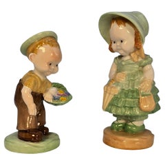 A pair of Mabel Lucie Attwell  porcelain figures made by Shelley, English C1930
