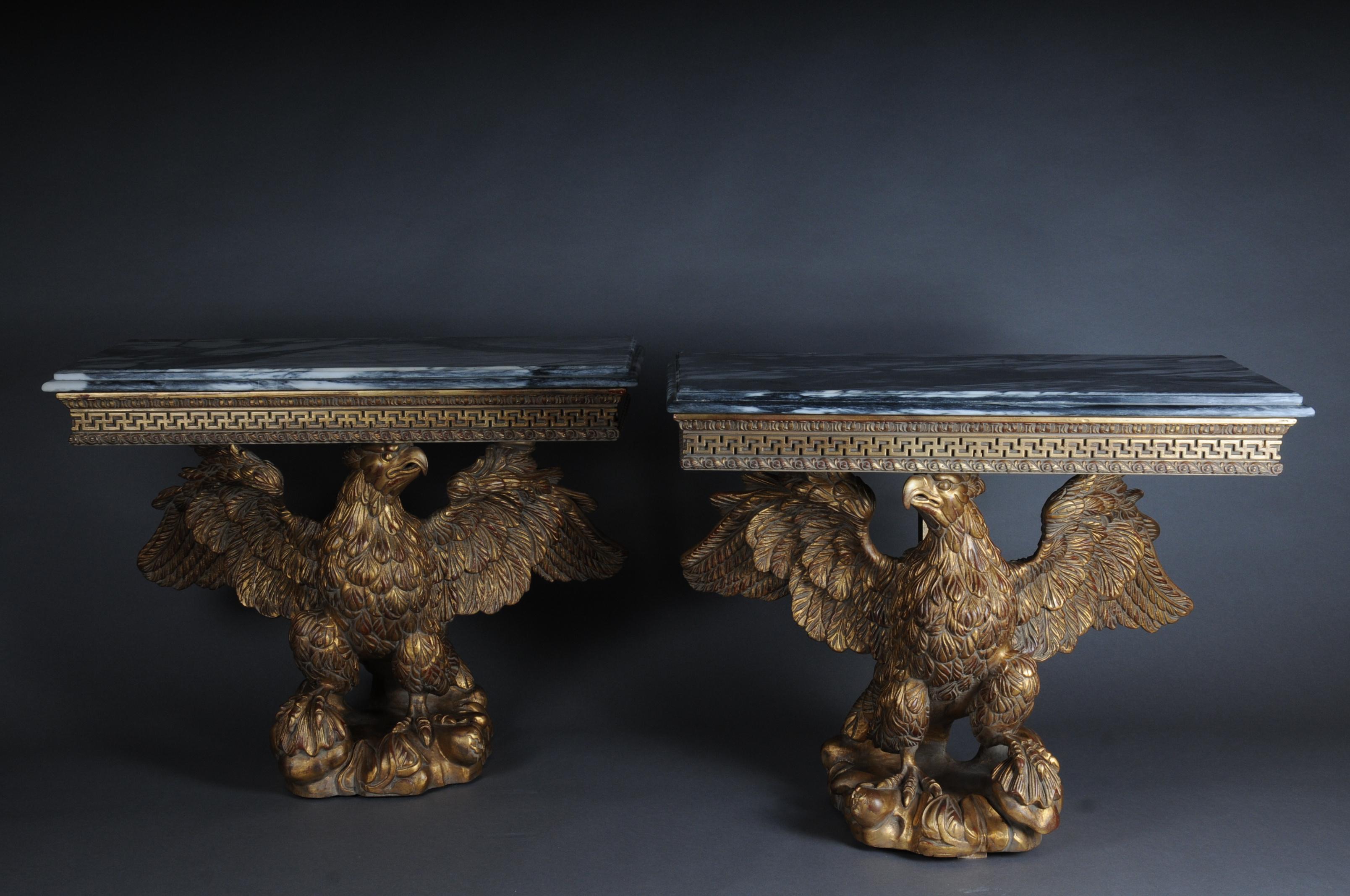 A pair of magnificent eagle consoles designed by William Kent 1685-1748

A few (2) consoles from the Régence era. Monumental, fully sculptural and hand carved eagles made of solid beech wood. Gilded, each standing on a rock-shaped base. Solid
