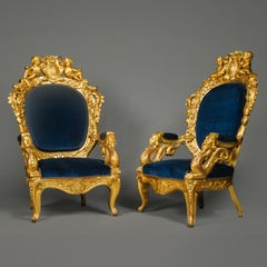 A Pair of Magnificent Giltwood Armchairs