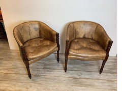 Pair of Mahogany and Distressed Leather Tub Chairs