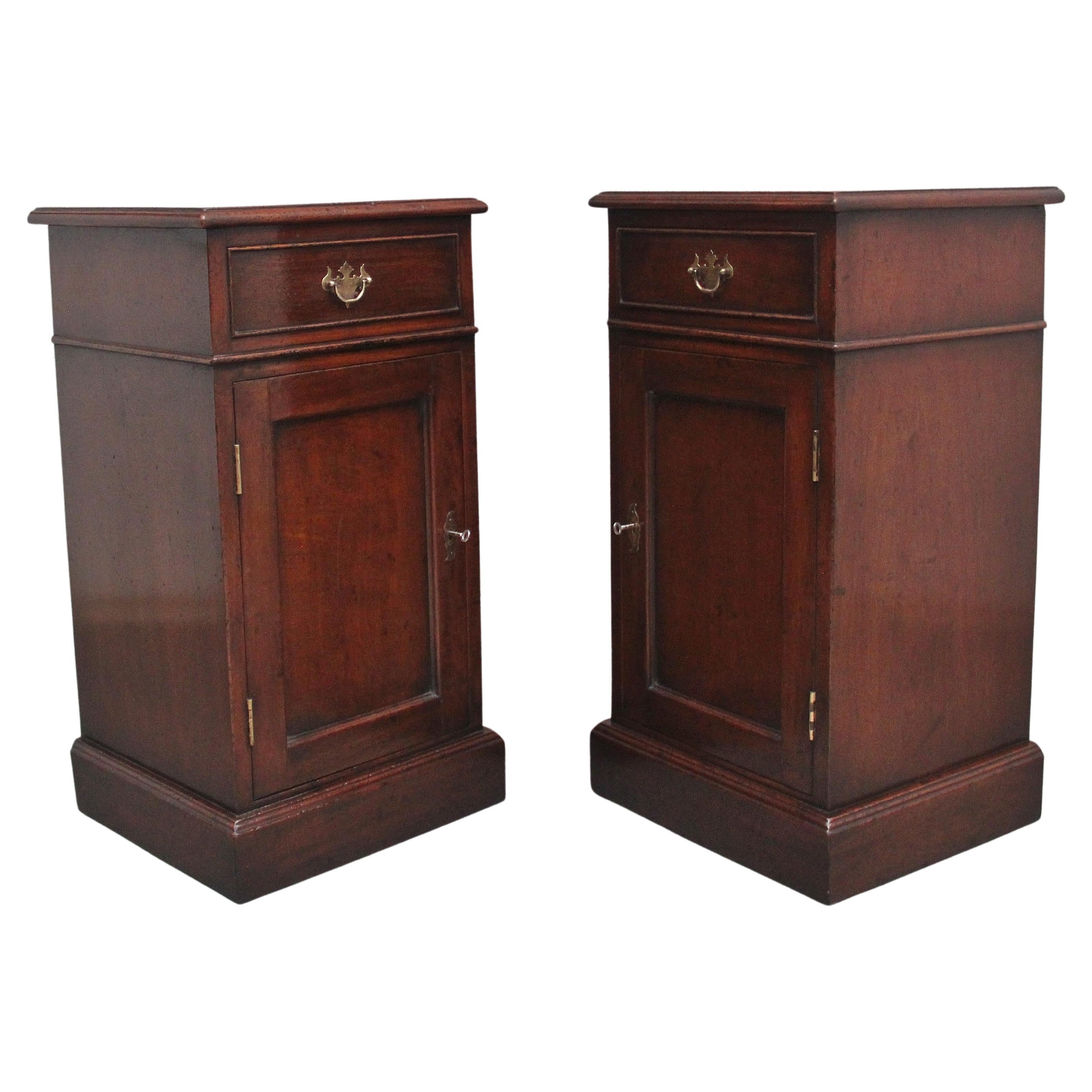 A pair of mahogany bedside cabinets 