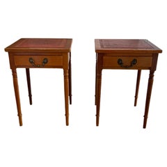 A Pair of Mahogany Bedside tables, Cabriole legs, Red Leather Gilt edged top.