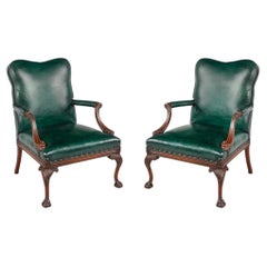 Antique A pair of mahogany open armchairs in the style of Chippendale