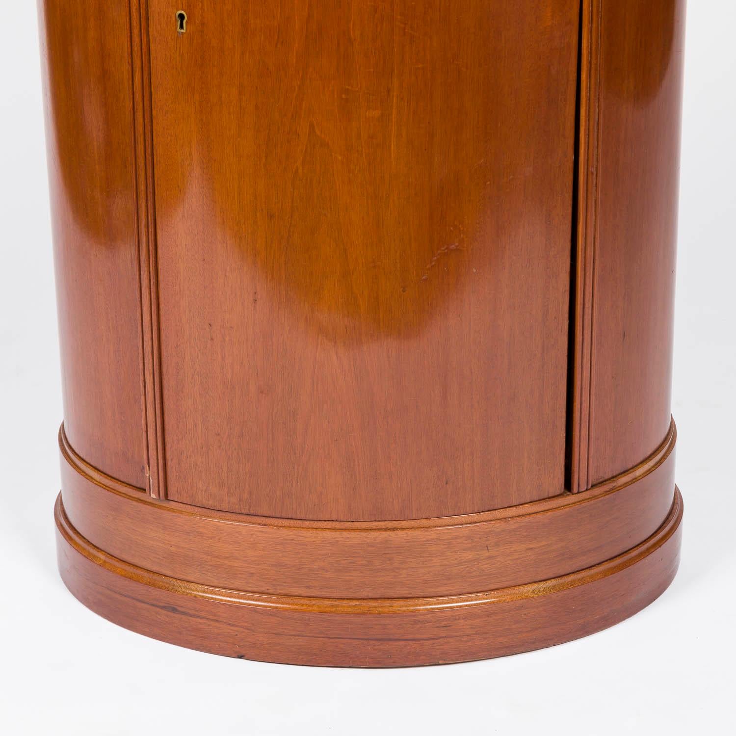 A pair of mahogany oval cabinets, Denmark, circa 1910. For Sale 1