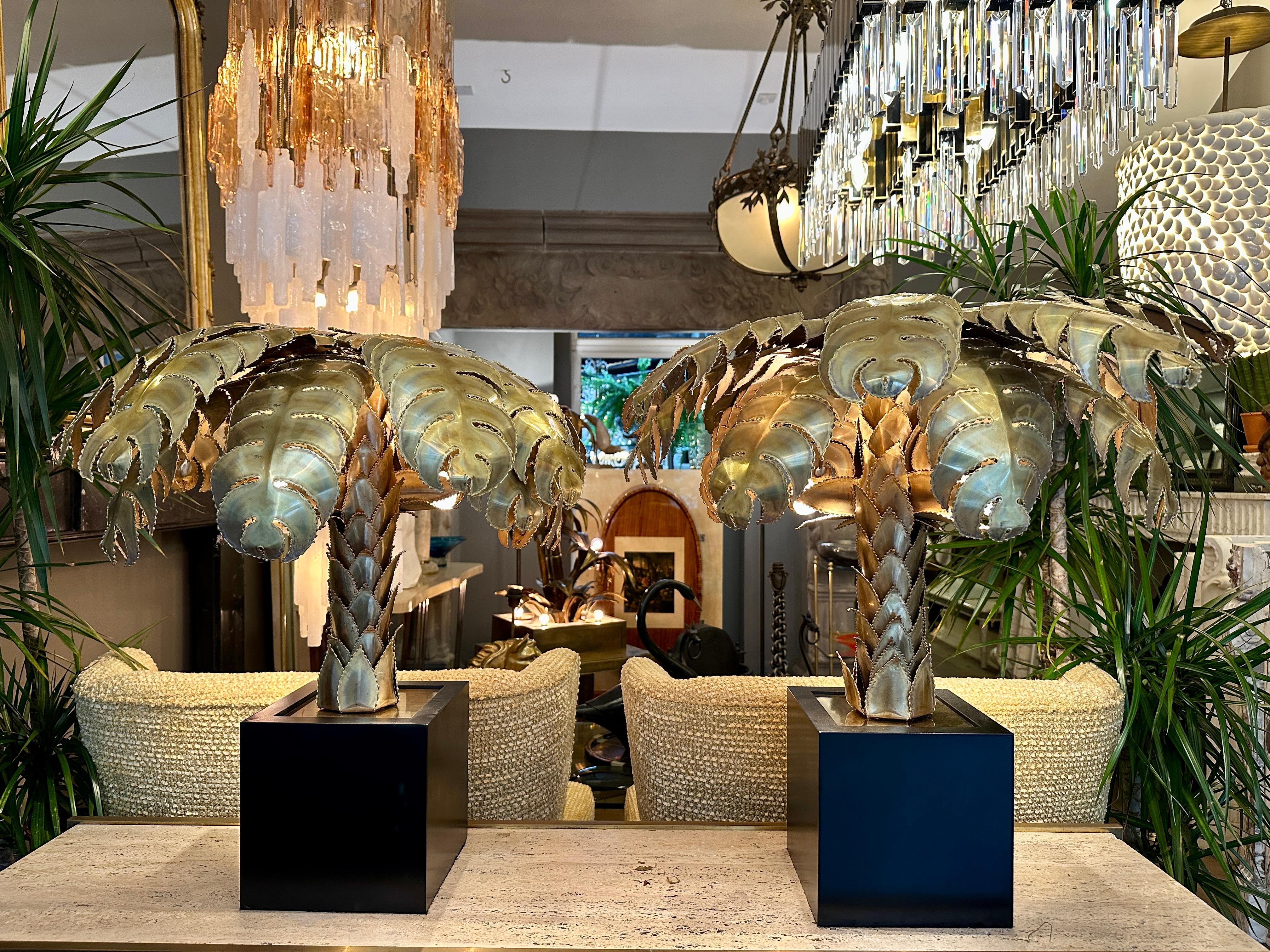 A large pair of Maison Jansen Palm Tree table lamps, 2 pairs available. 
In as new condition after being purchased from a Ballet studio owner in Amsterdam who originally purchased them from Maison Jansen to use as Chandeliers and never did. Put back
