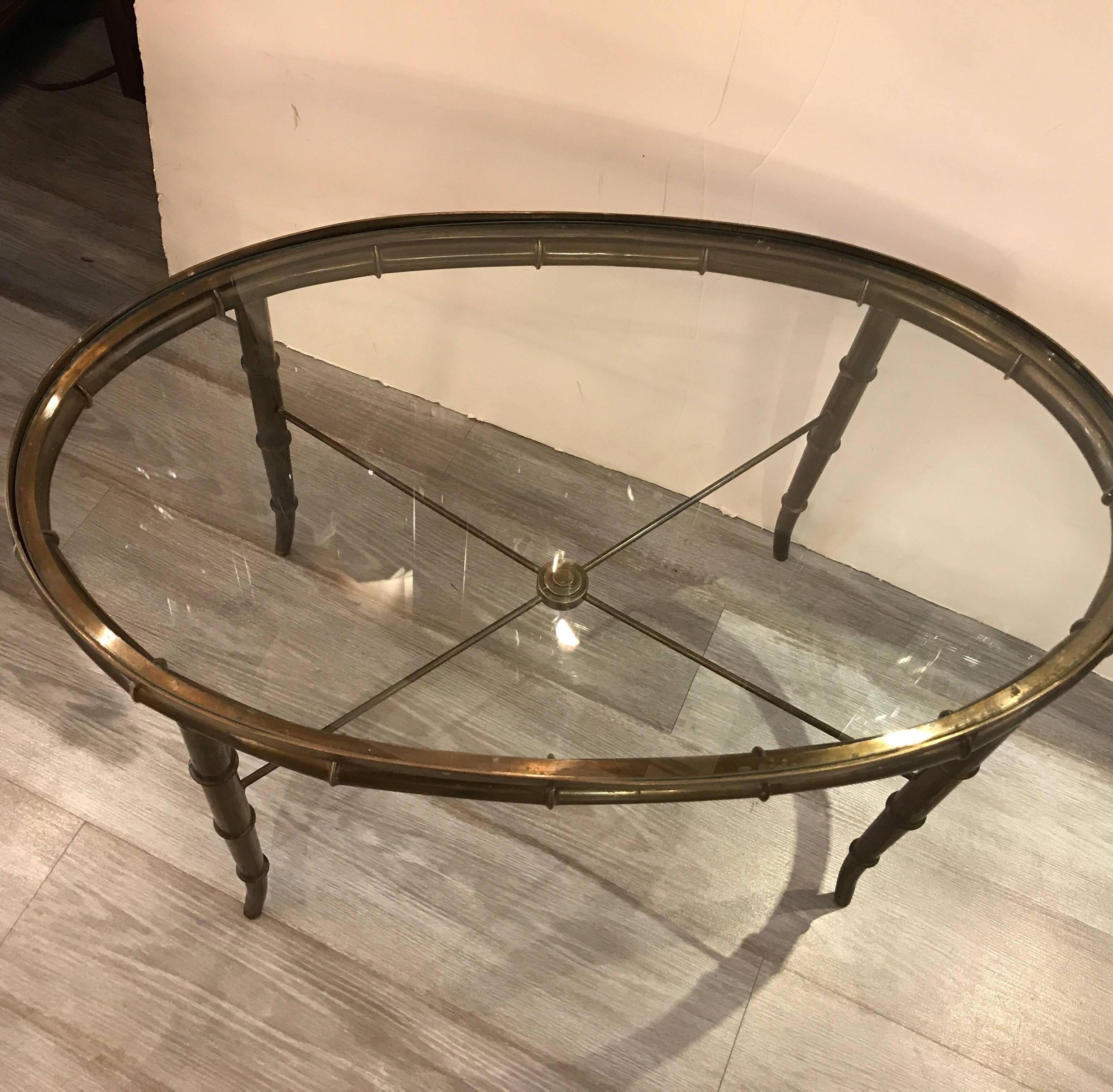 Patinated Pair of Mastercraft Oval Coffee Tables