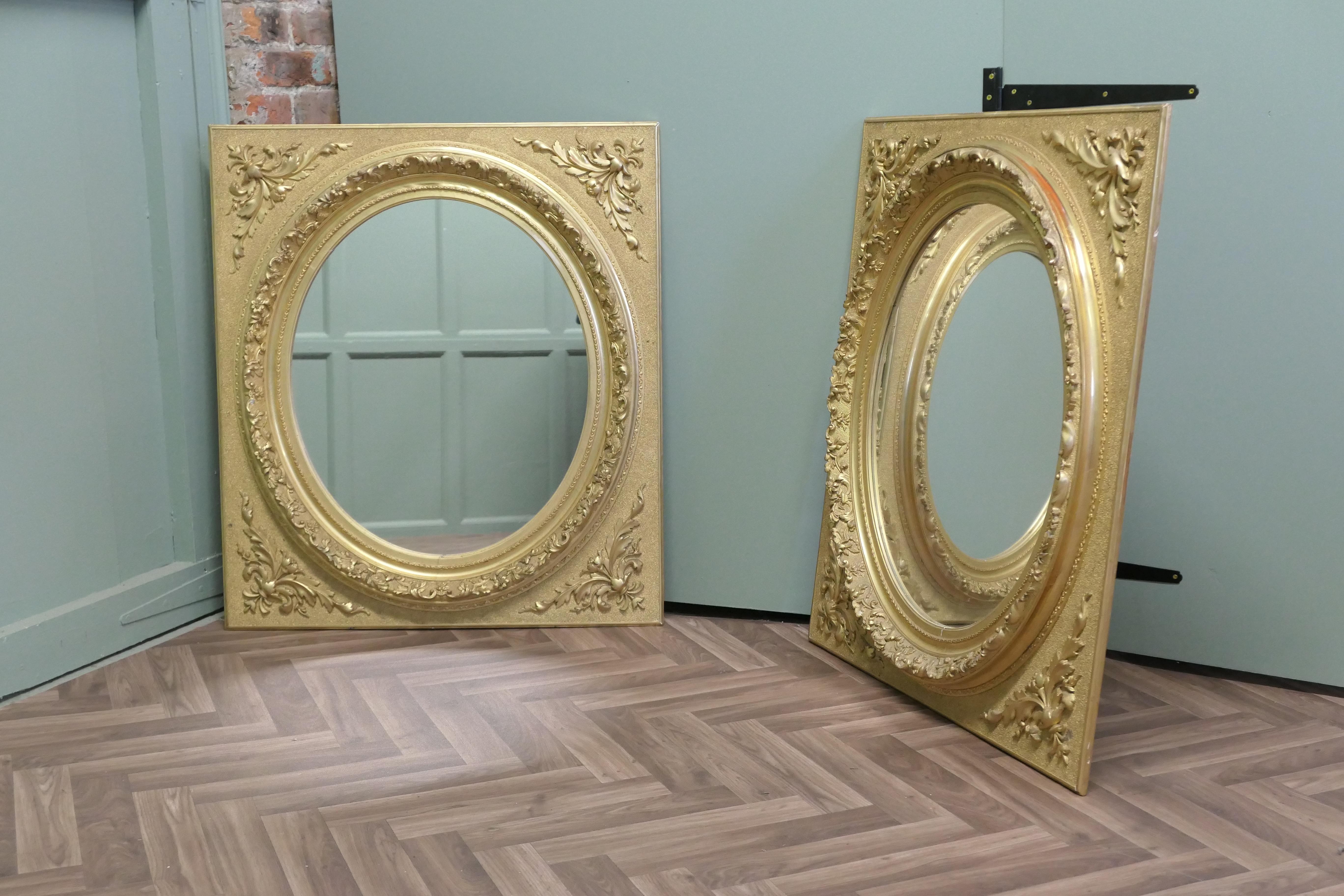 Belle Époque A Pair of Matching Panel Mirrors, 2 Oval Gold Leaf Mirrors For Sale