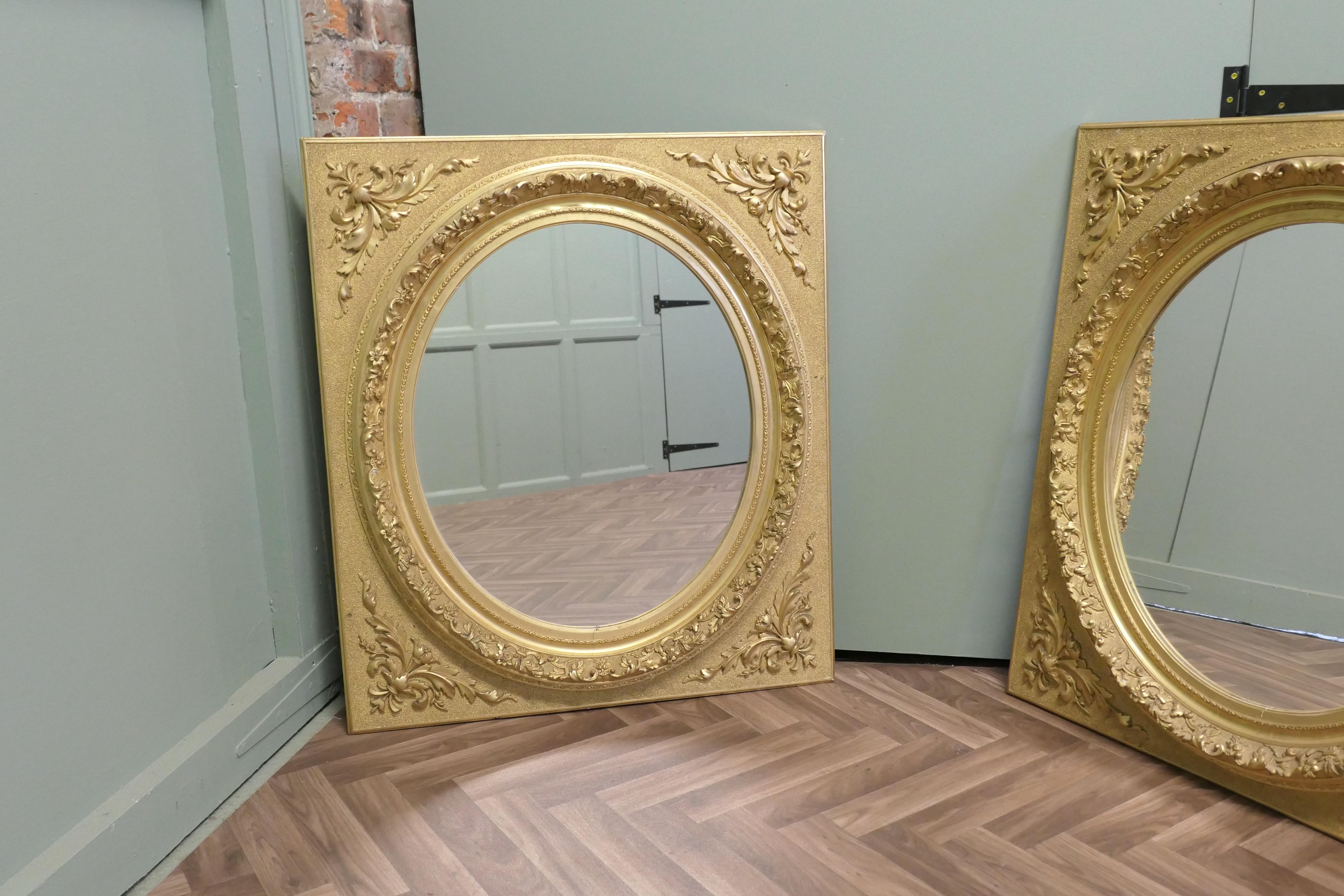 A Pair of Matching Panel Mirrors, 2 Oval Gold Leaf Mirrors For Sale 1