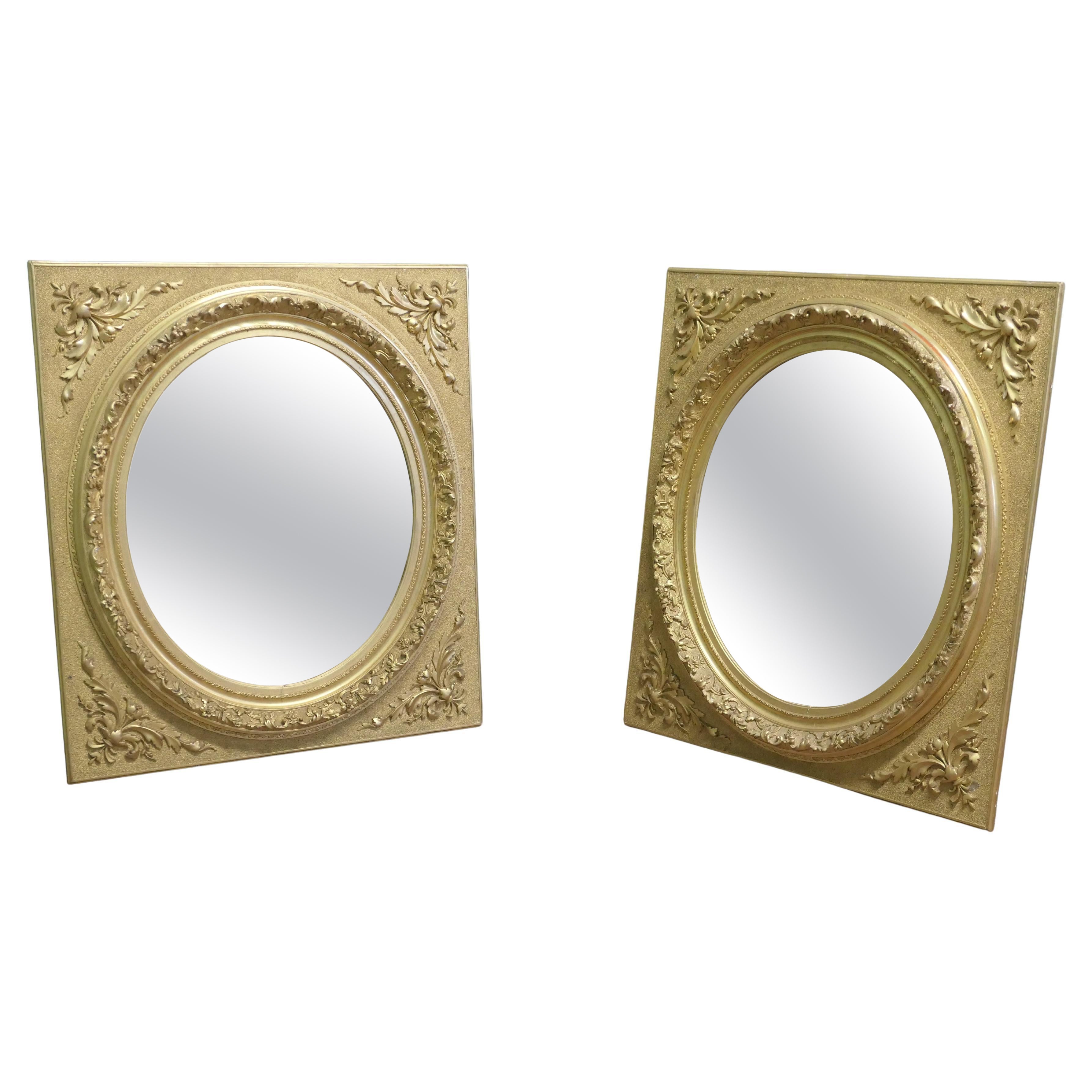 A Pair of Matching Panel Mirrors, 2 Oval Gold Leaf Mirrors For Sale