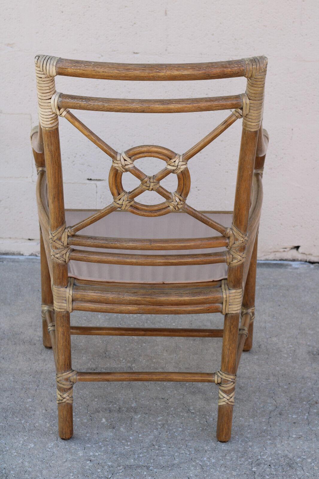 A Pair of McGuire San Francisco Rattan Target Arm Chairs or Dining Chairs For Sale 1