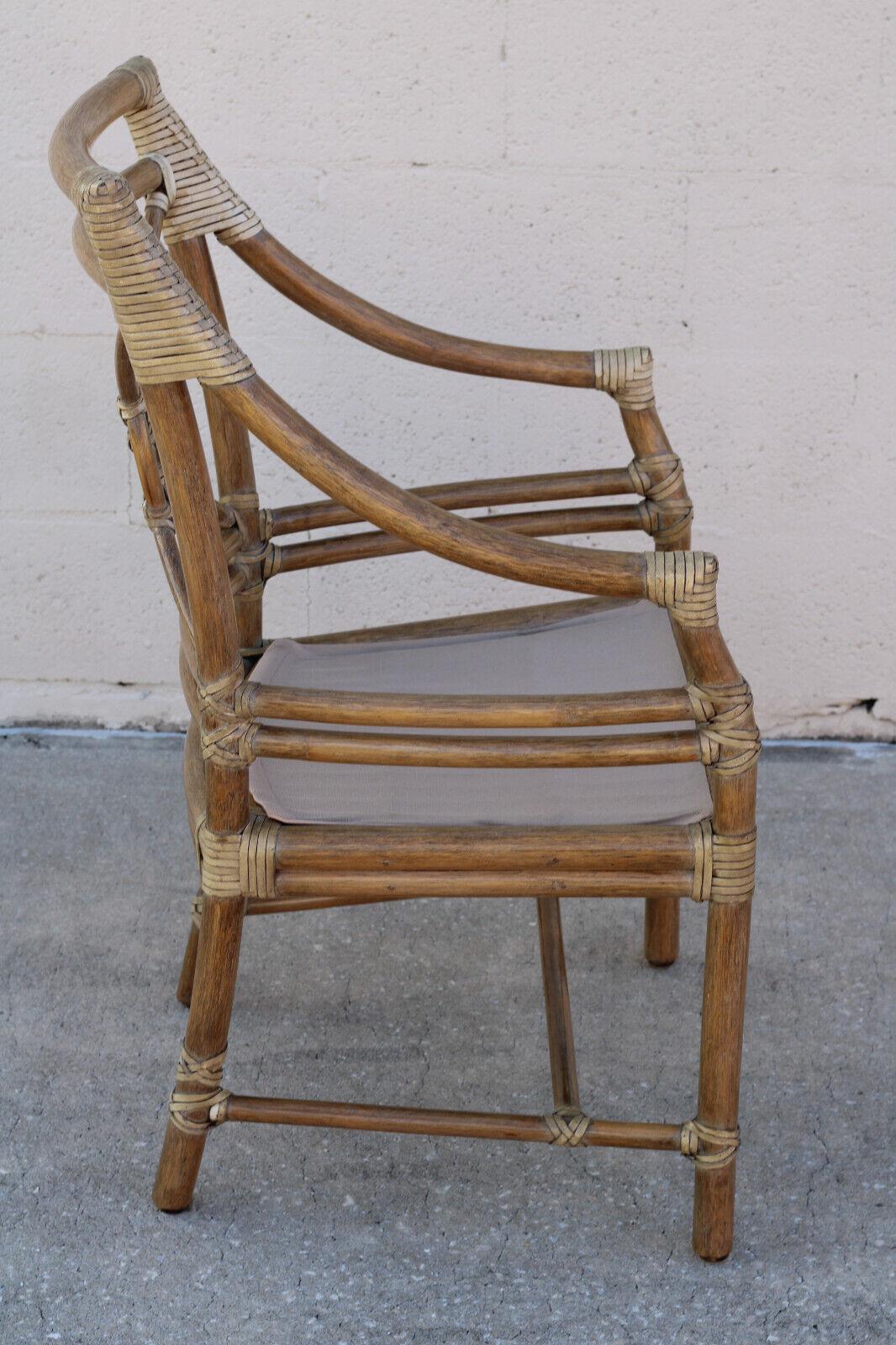 American A Pair of McGuire San Francisco Rattan Target Arm Chairs or Dining Chairs For Sale