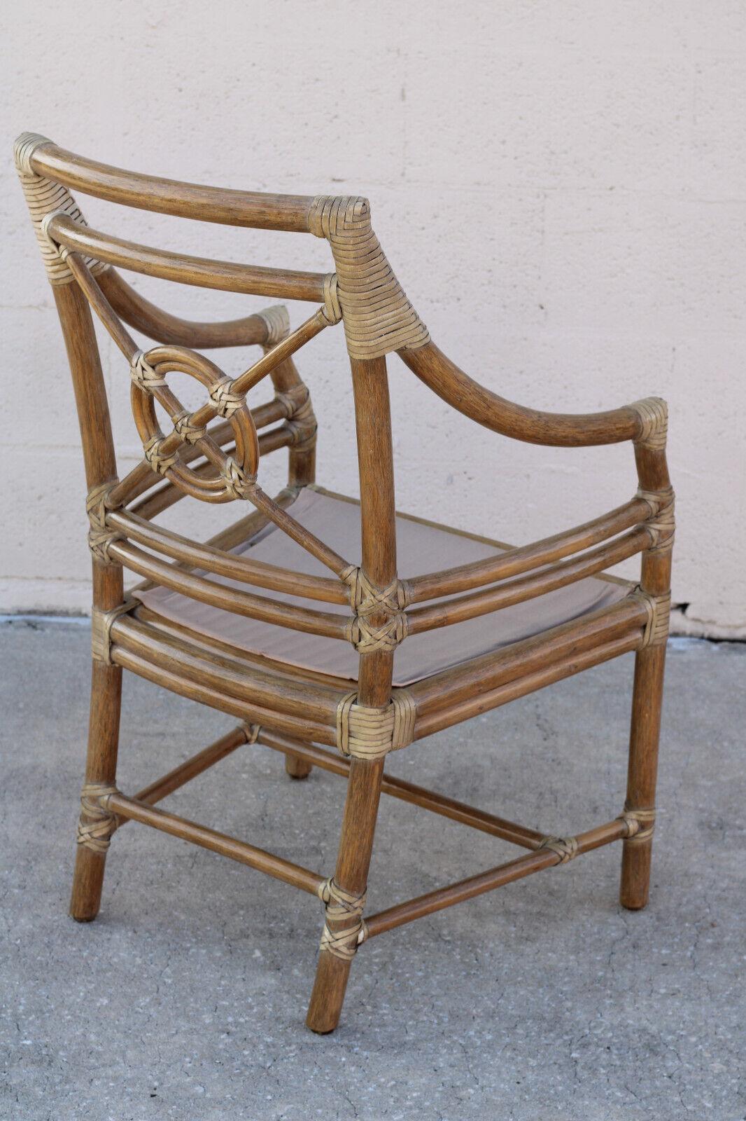 20th Century A Pair of McGuire San Francisco Rattan Target Arm Chairs or Dining Chairs For Sale