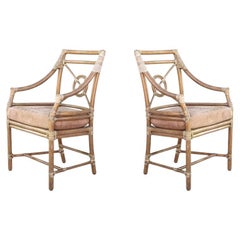 A Pair of McGuire San Francisco Rattan Target Arm Chairs or Dining Chairs
