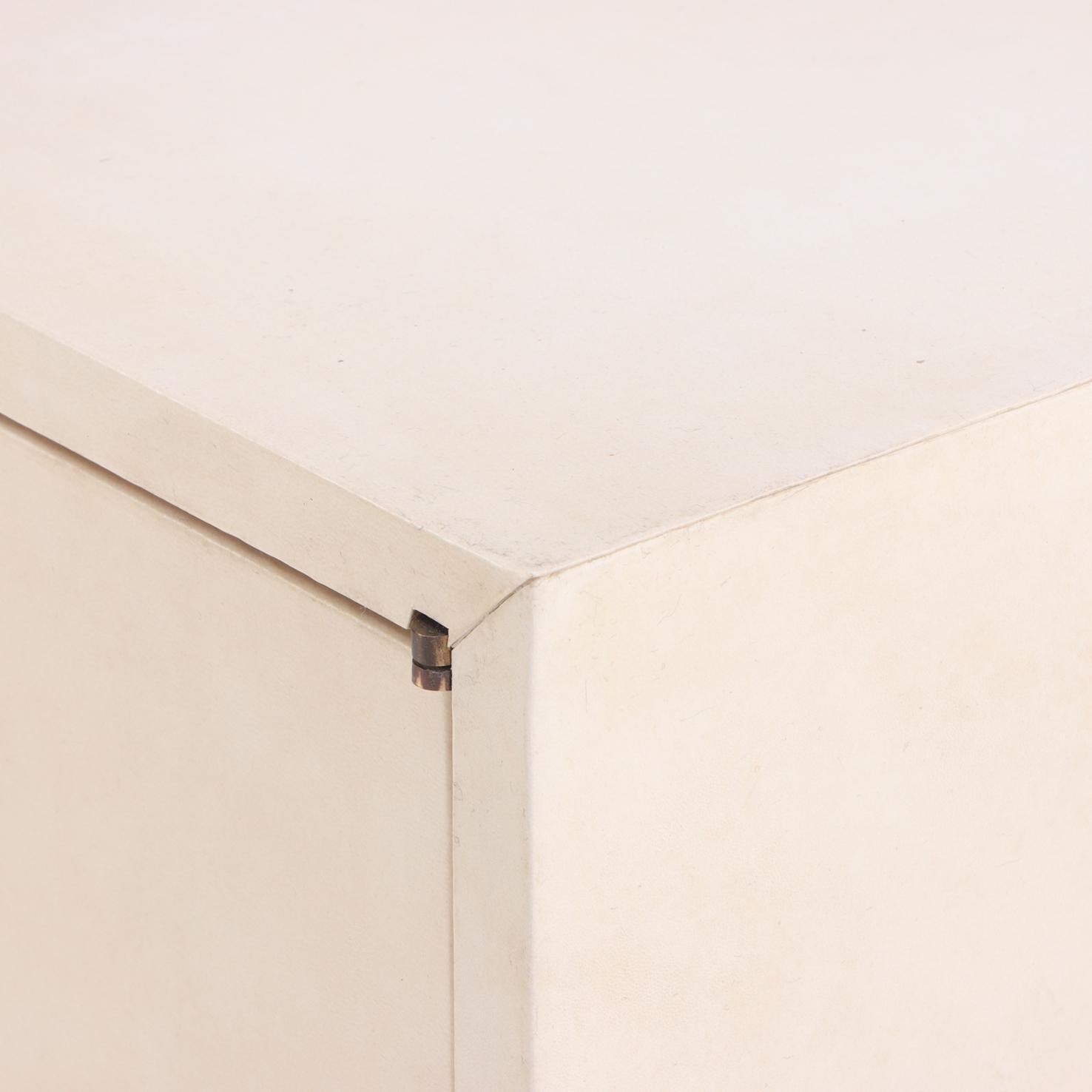 Mid-Century Modern A Pair of MCM Pergamino Covered Cabinets / Nightstands, C. 1950. For Sale