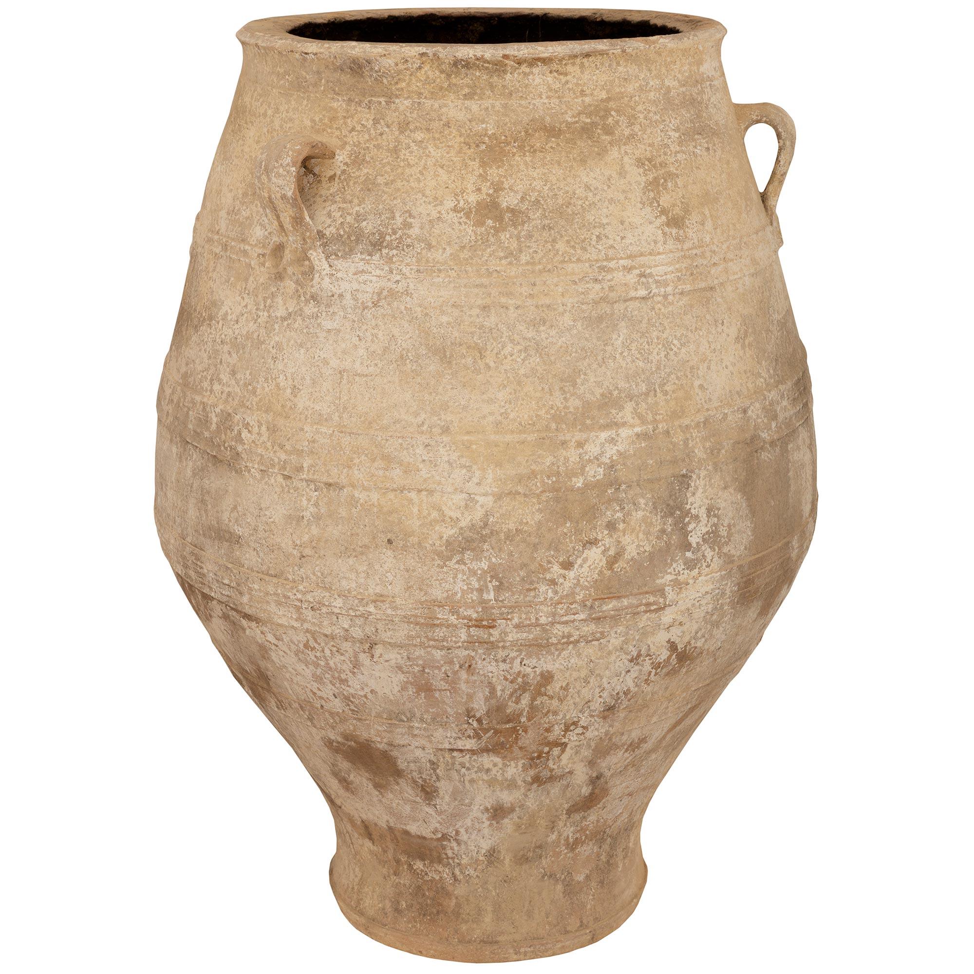 Greek A pair of Mediterranean 19th century patinated Terra Cotta olive jars For Sale