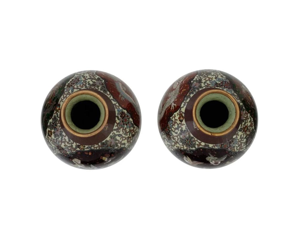 A Pair of Meiji Japanese Cloisonne Enamel Dragon, Doves, Ho Ho Birds Vases In Good Condition In Long Island City, NY