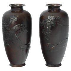 A pair of Meiji period bronze vases