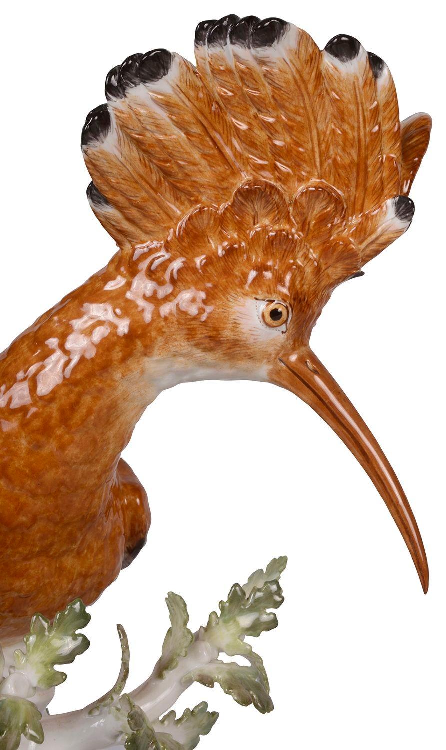 A pair of Meissen Hoopoe birds naturalistically modelled perched on leafy tree stumps after the models by J J Kandler with blue crossed sword marks, 19th century.
 
Batch 71 61579 DLYKN.