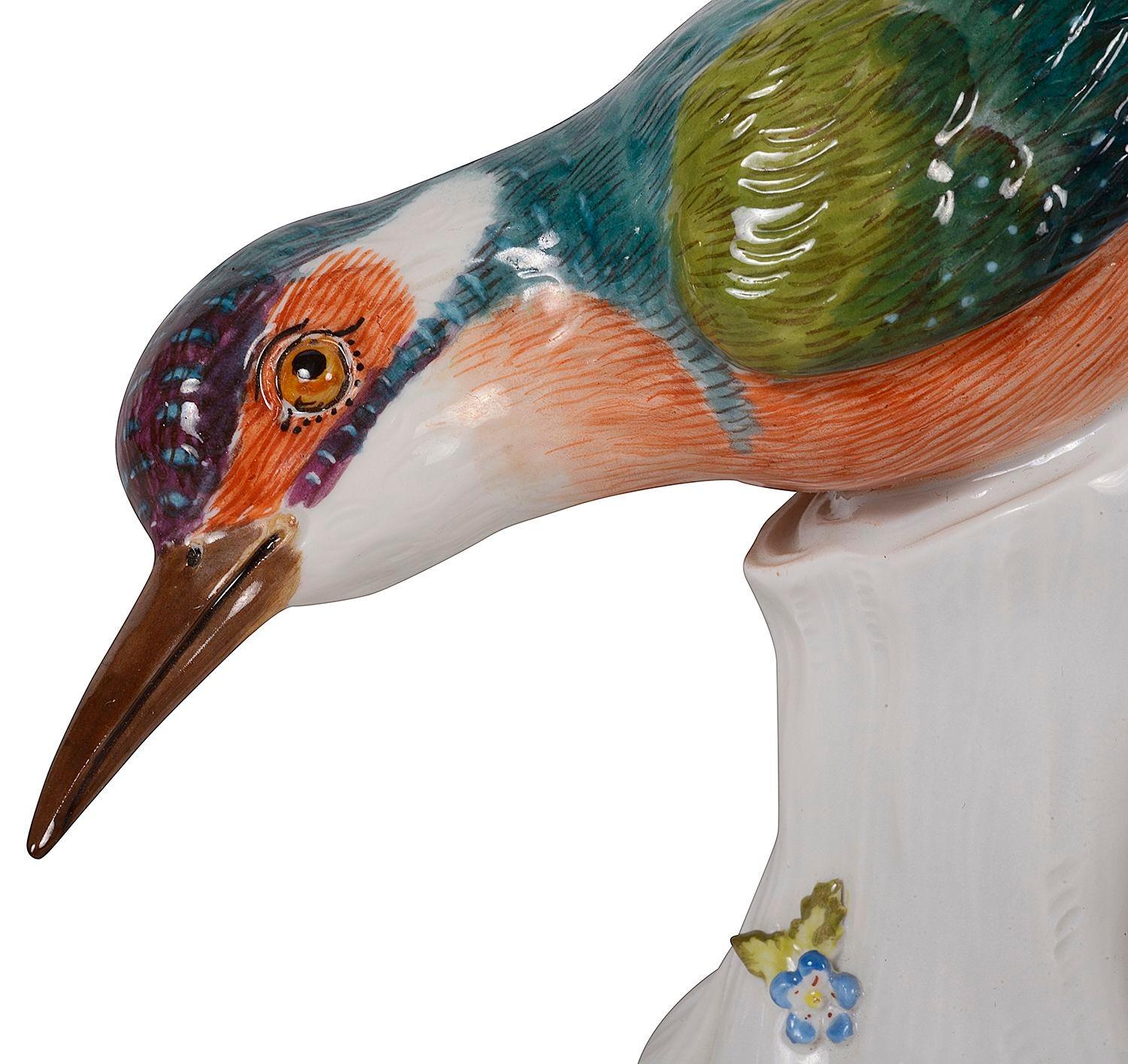 An enchanting pair of naturalistically modelled Meissen kingfishers perched on tree stumps, each with wonderful colour and signed to the bases with the blue crossed sword of the Meissen factory. Early 20th Century.
Measures: Taller figure 24cm high