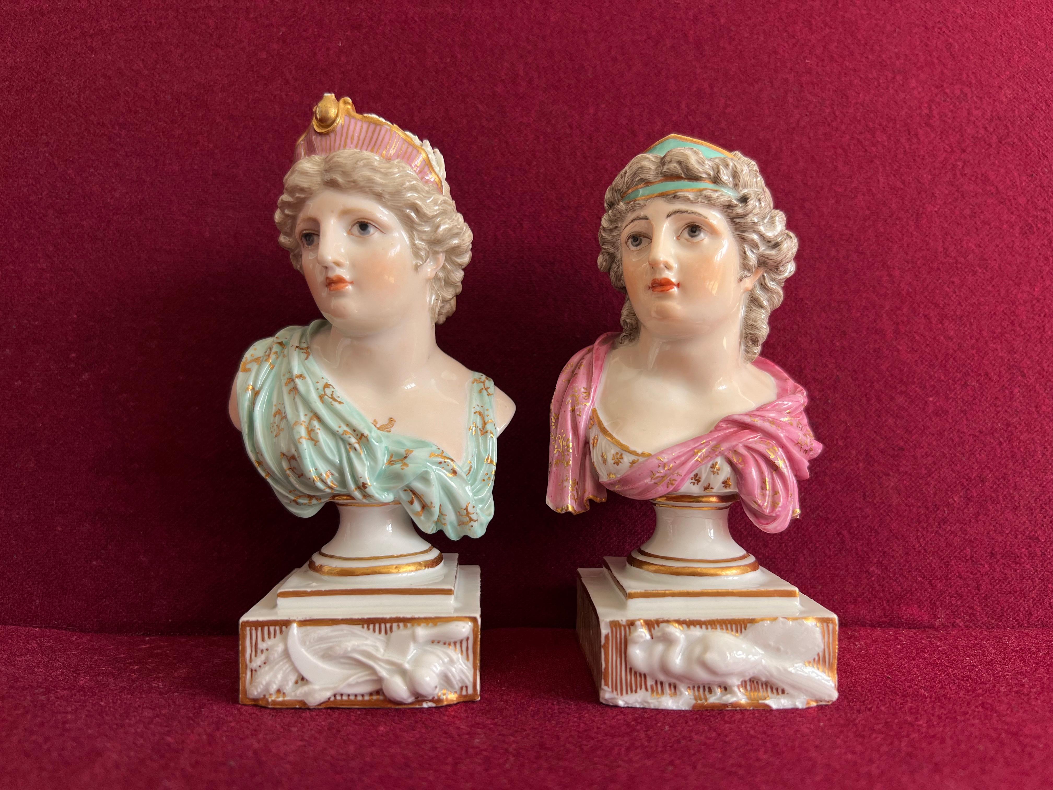A pair of Meissen porcelain busts circa 1800 Ceres and Juno. Very finely modelled, hand painted and gilded.

Crossed swords mark to base and impressed model numbers.

Condition: Chips to the headdress of Ceres and chips to the base of Juno.