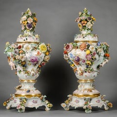A Pair of Meissen Porcelain Flower-Encrusted Vases, Covers and Stands