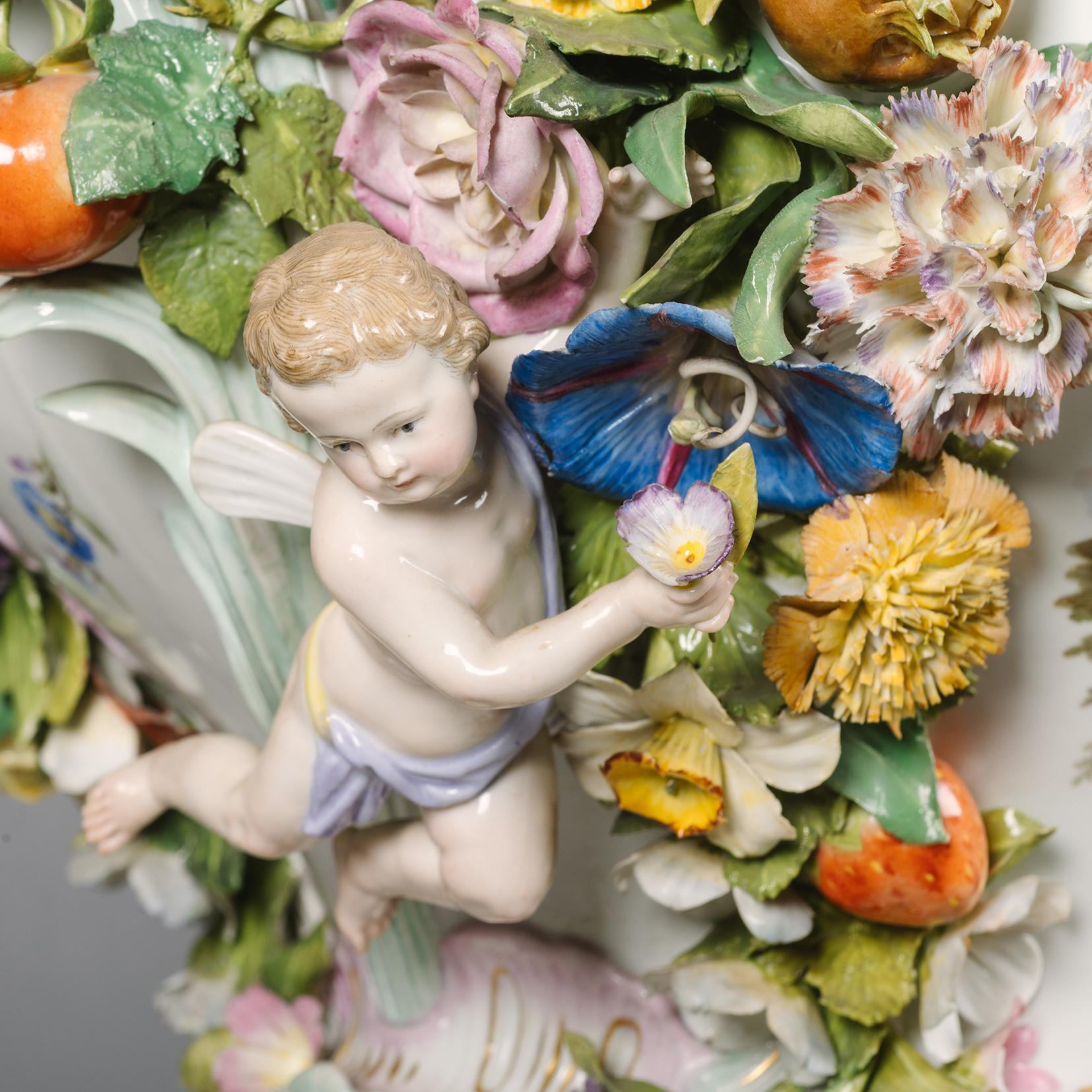 Rococo A Pair of Meissen Porcelain Flower-Encrusted Vases, Covers and Stands