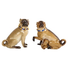 A Pair of Meissen Porcelain Pug Dogs with Gilt Bell Collars & One w/ Child