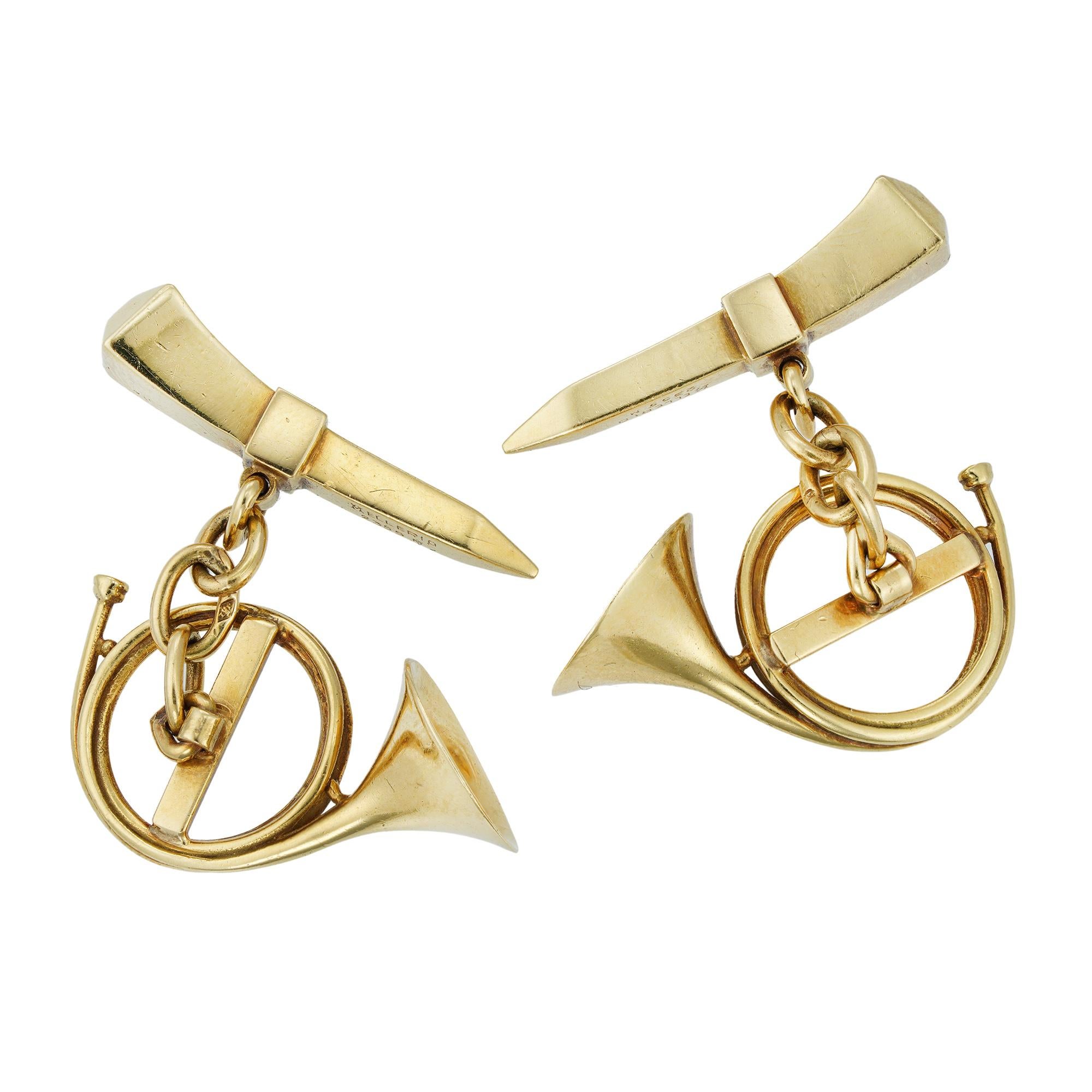 A fine pair of Turn-of-last-Century cufflinks, each cufflink comprising a nail and hunting horn motif, with chain fitting, all in yellow gold, signed Mellerio 2355M, bearing Fench hallmark for 18ct gold, circa 1900, the horm measuring approximately