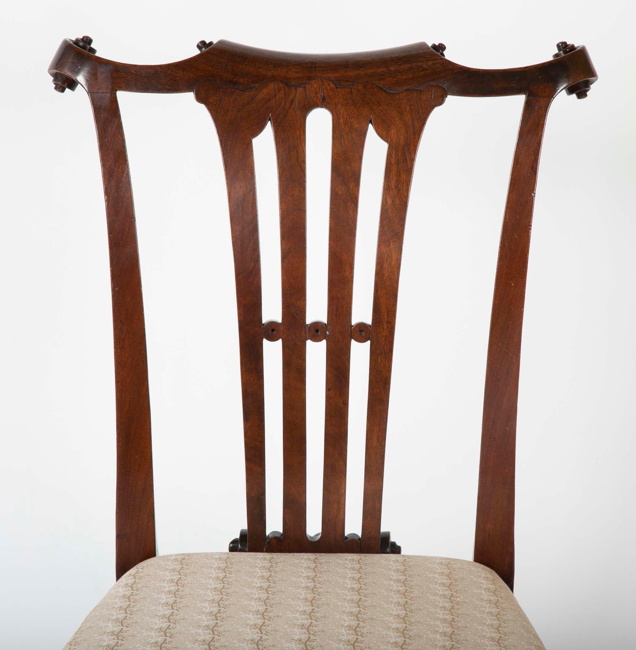 A pair of exuberantly carved walnut side chairs, believed to be Irish.
Provenance- Collection of Dr. Andrew and Ziva Dahl Sothebys 5951 Lot 467.
 