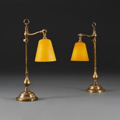 A pair of mid 19th century brass student lamps