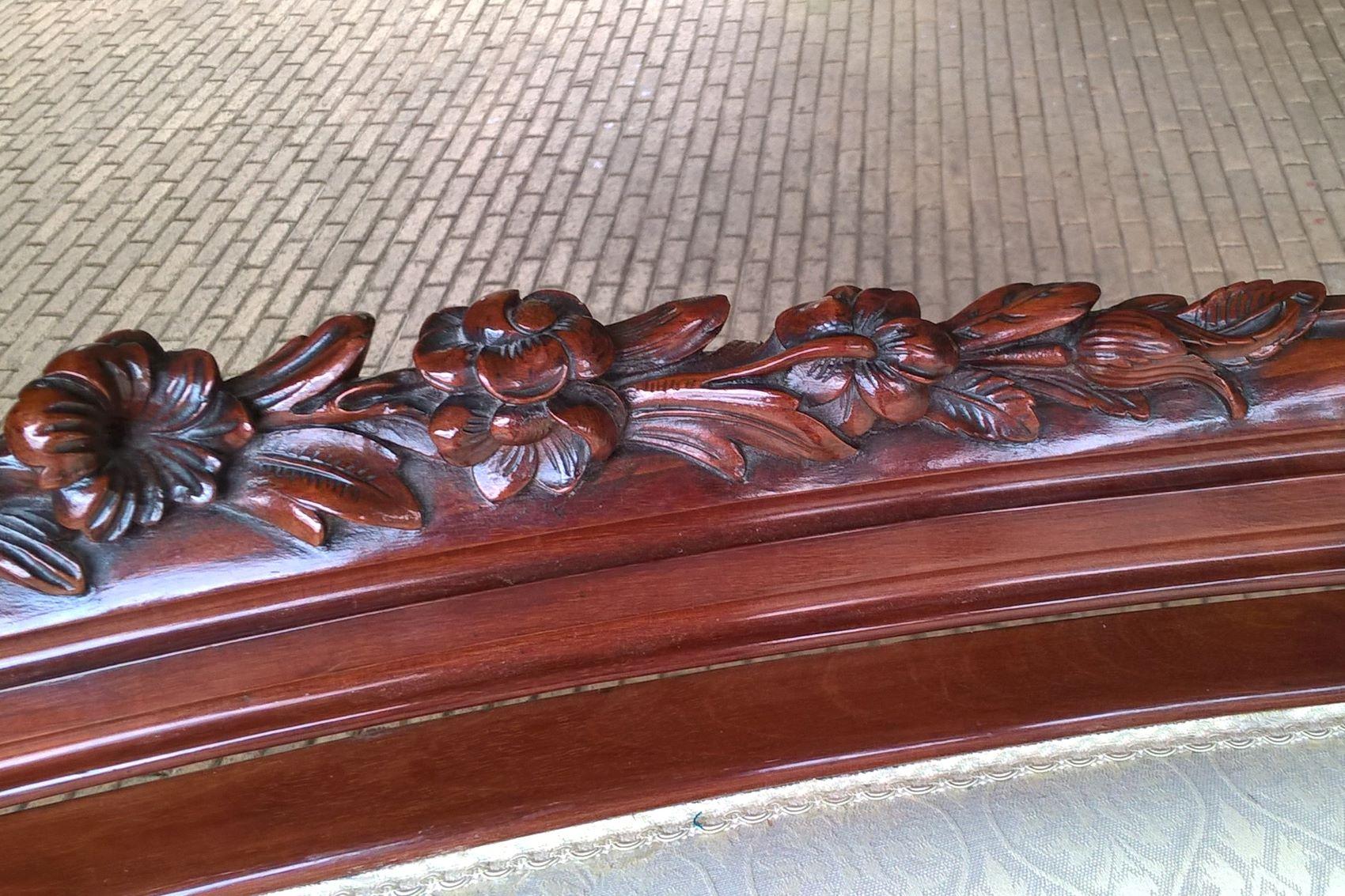 European Pair of Mid-19th Century Continental Carved Mahogany Framed Serpentine Sofa's For Sale
