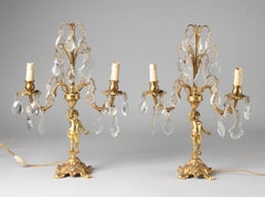 Pair of Mid-20th Century French Copper Girandoles with Putti and Crystal Drops